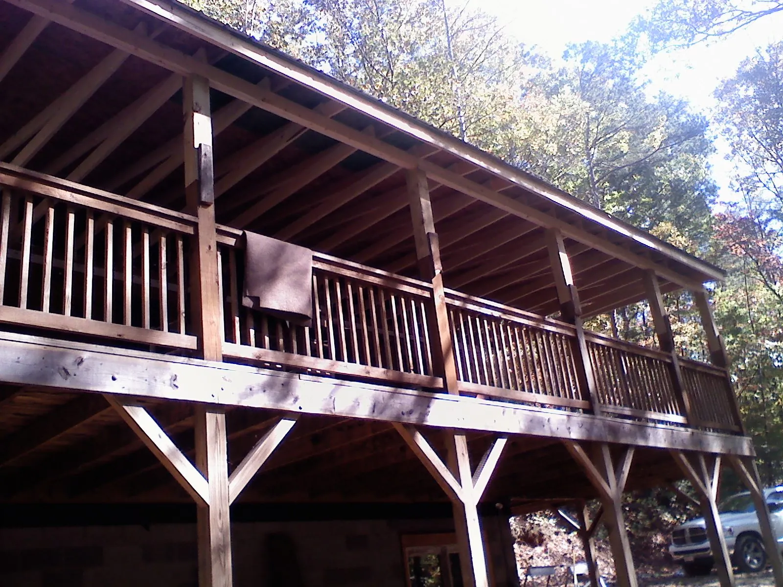 Timber framing under a new elevated porch and deck — Roof Leak Repair in Copperhill by Roofing Brothers